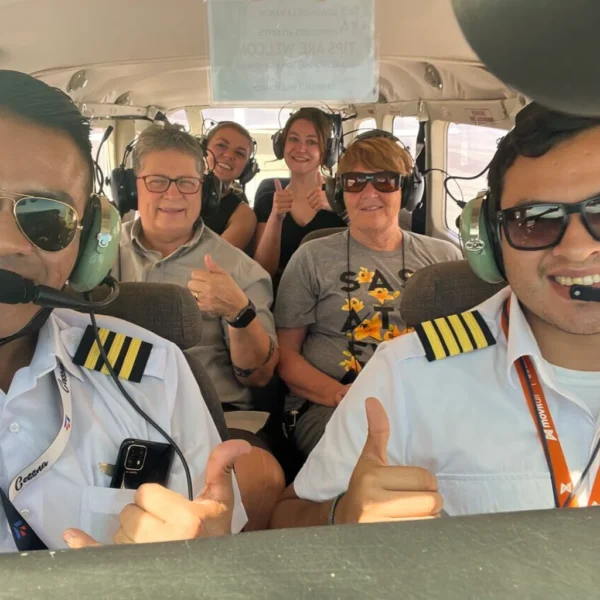 Group of travelers flying over the Nazca Lines - Bus from Huacachina to Nazca - Wayki Bus