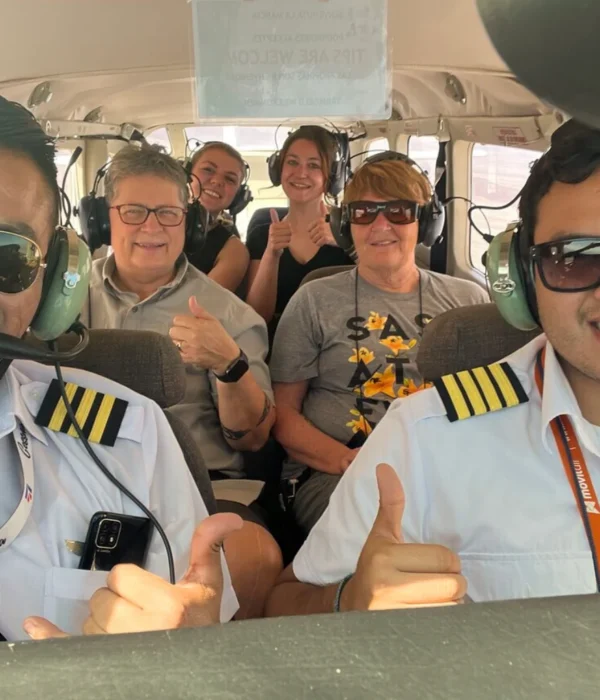 Group of travelers flying over the Nazca Lines - Bus from Huacachina to Nazca - Wayki Bus