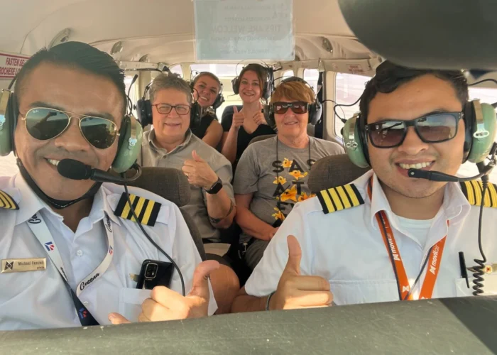 Group of travelers flying over the Nazca Lines - Bus from Huacachina to Nazca - Wayki Bus