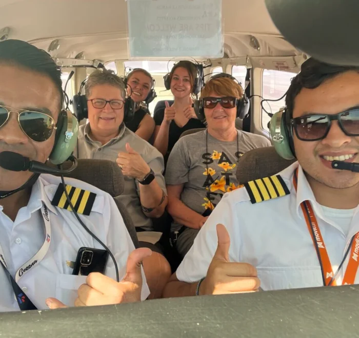 Group of travelers flying over the Nazca Lines - Bus from Huacachina to Nazca - Wayki Bus
