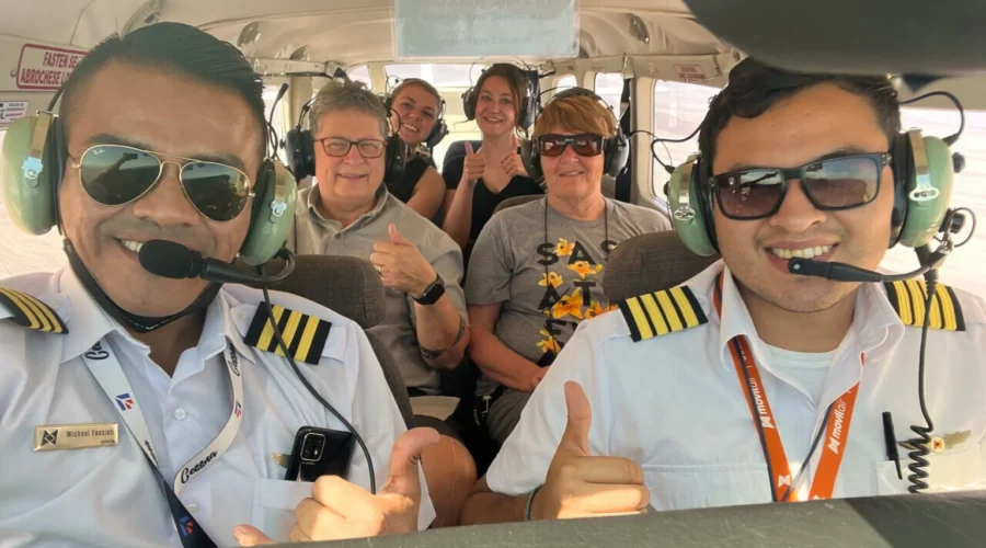 Group of travelers flying over the Nazca Lines - Bus from Huacachina to Nazca - Wayki Bus