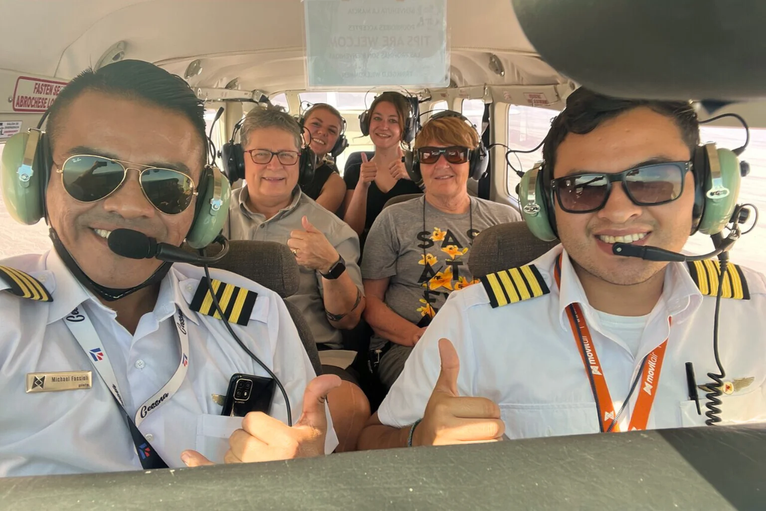 Group of travelers flying over the Nazca Lines - Bus from Huacachina to Nazca - Wayki Bus